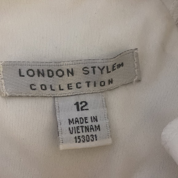 Black and white worn once mid-level dress with the zipper - Picture 2 of 4